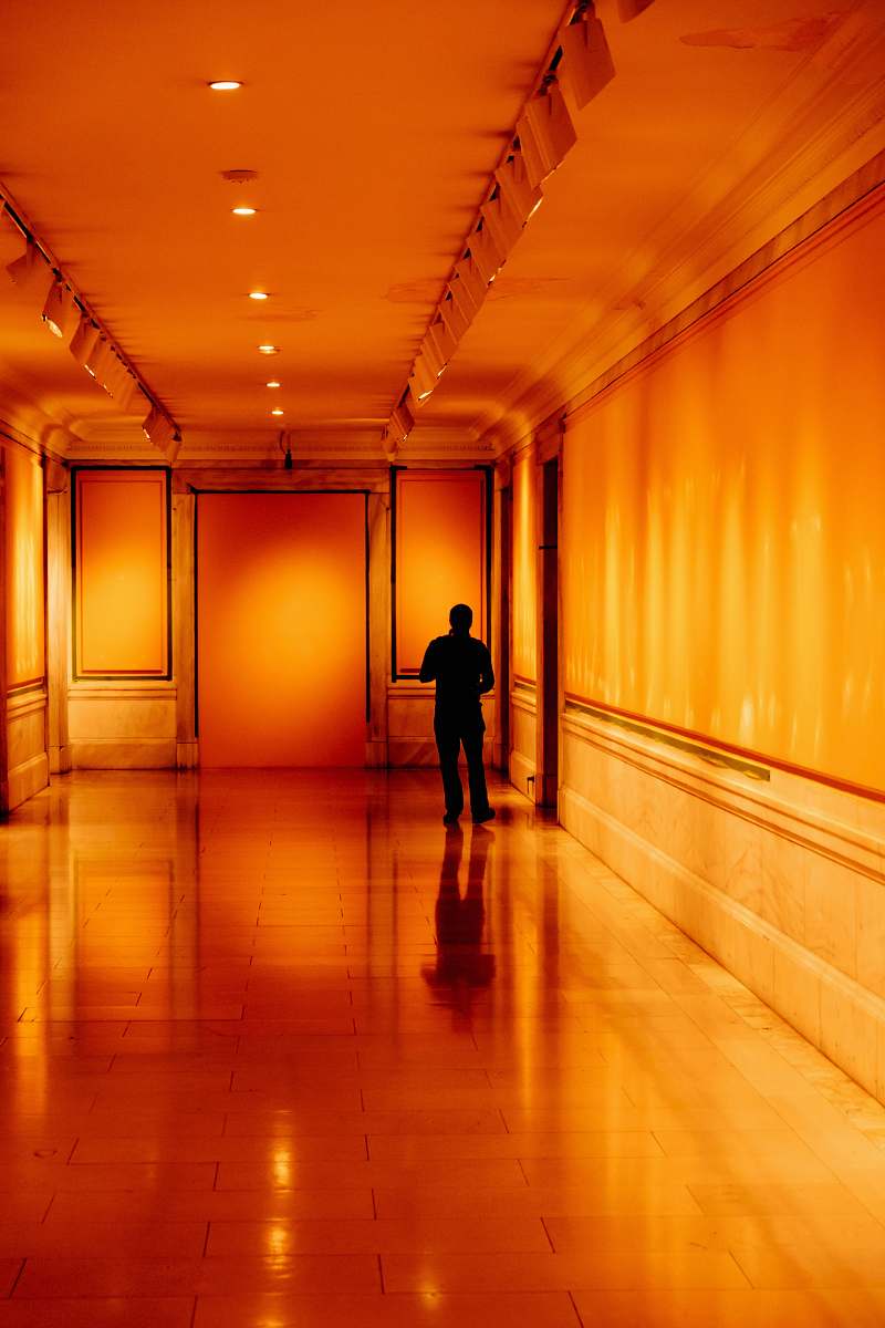 new york person stands near entrance tunnel